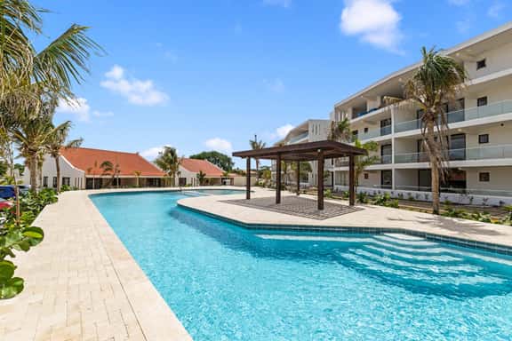 J&M Coral - Modern 2BR & Shared Pool near Mambo - Image 1